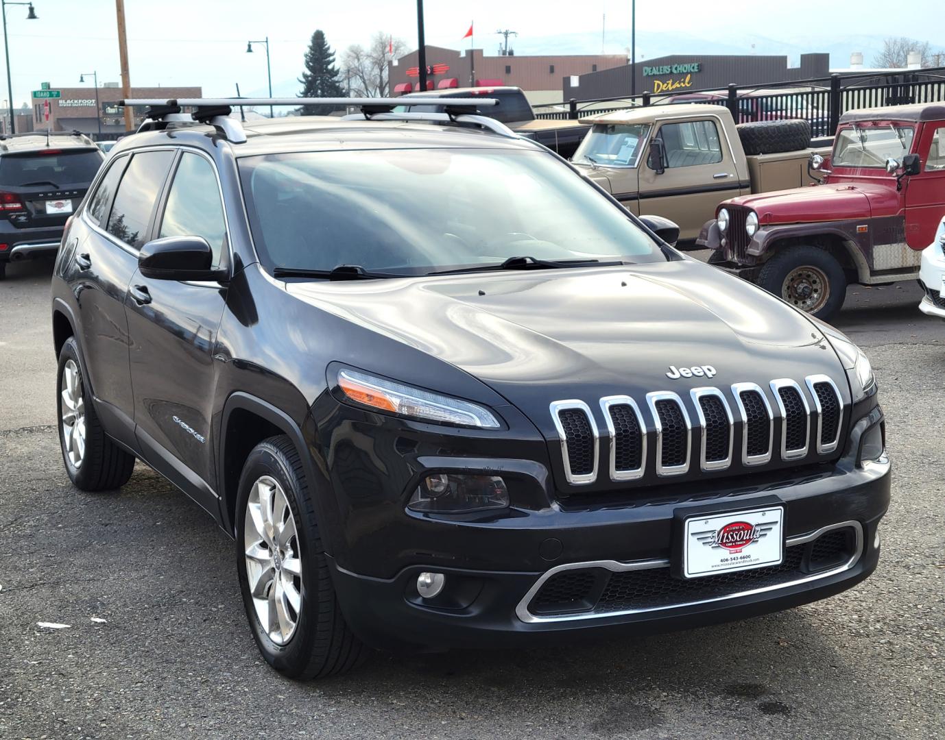 2015 Black /Black Jeep Cherokee Limited (1C4PJMDS4FW) with an 3.2L V6 engine, Automatic transmission, located at 450 N Russell, Missoula, MT, 59801, (406) 543-6600, 46.874496, -114.017433 - Nice Jeep. Lots of Features. 4 Wheel Drive. Automatic. Huge Sunroof. Leather Heated Seats. Power Drivers Seat. Heated Steering Wheel. Bluetooth. Steering Wheel Controls. Air. Cruise. Tilt. Power Windows and Locks. Towing. - Photo#3